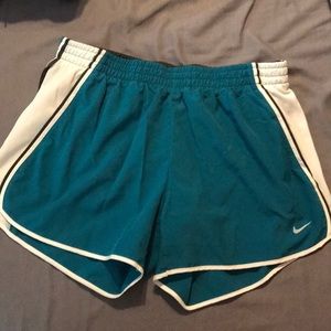 Teal Nike running shorts, medium